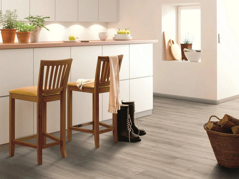 Завантажте зображення в засіб перегляду галереї, mountain grey oak plank laminate flooring displayed in a kitchen