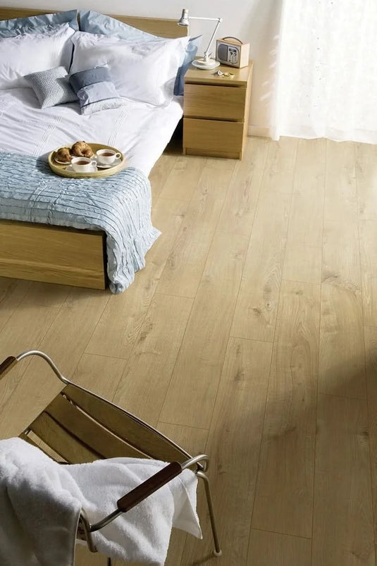 barnyard oak laminate flooring displayed in a bedroom