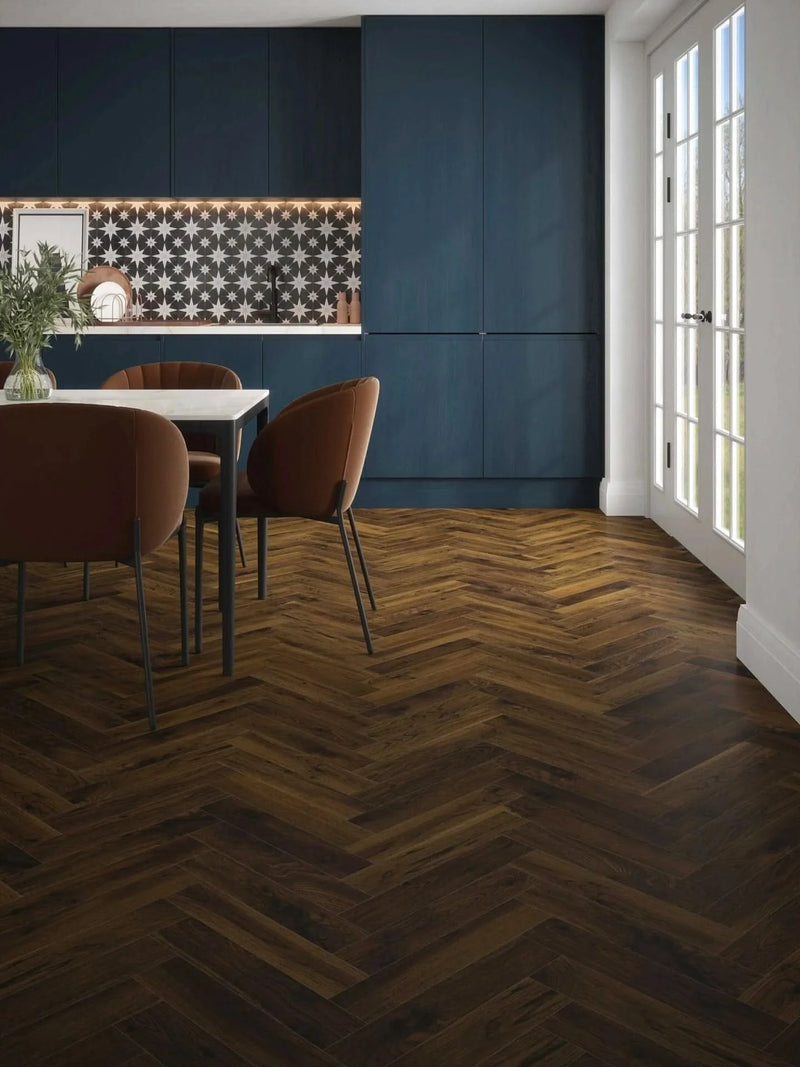 Завантажте зображення в засіб перегляду галереї, smoked cathedral oak herringbone laminate flooring displayed in a kitchen