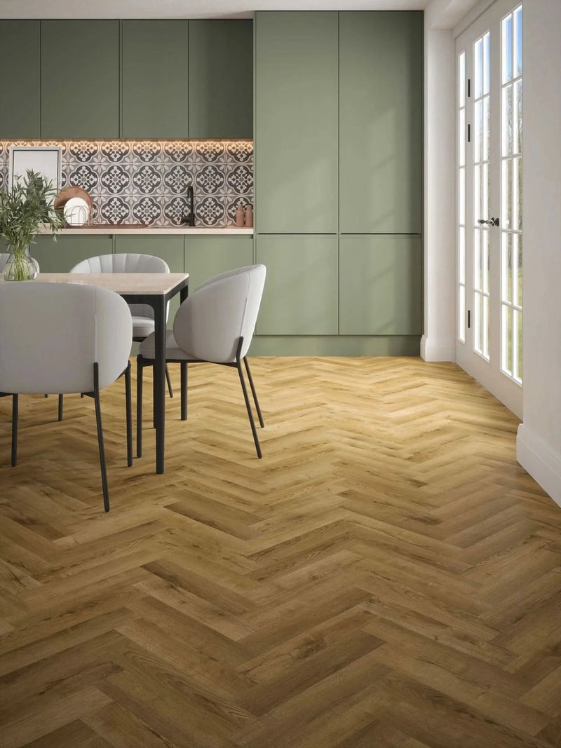 Завантажте зображення в засіб перегляду галереї, stade oak herringbone laminate flooring displayed in a kitchen