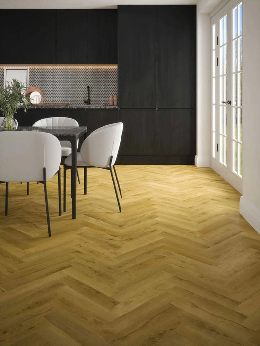albi honey oak herringbone laminate flooring on display in a kitchen