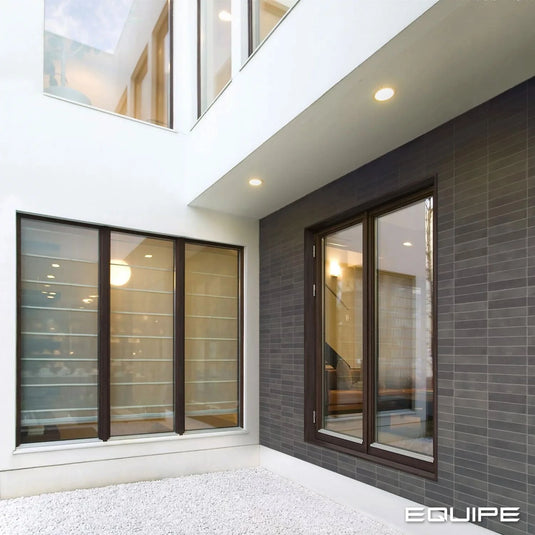 argile tile in dark, 6x24.6cm on the outside wall