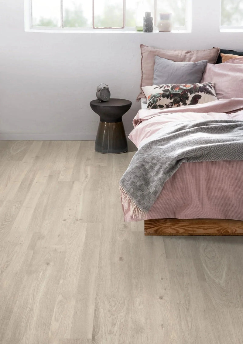Load image into Gallery viewer, white corton oak grey laminate flooring displayed in a bedroom