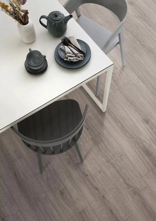 grey sherman oak large aqua laminate flooring on display in a kitchen