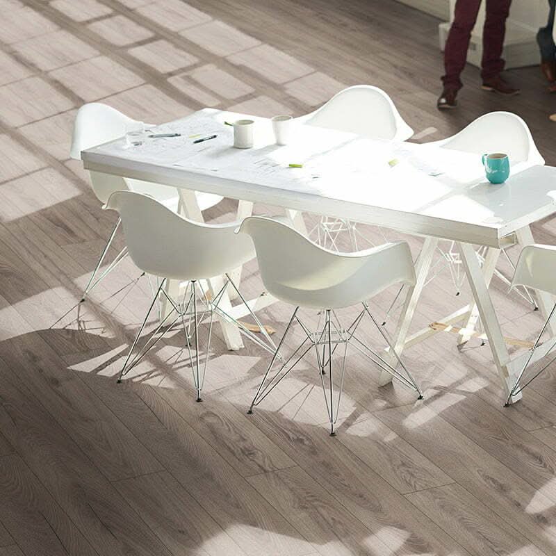 Załaduj obraz do przeglądarki galerii, rutherford oak aqua laminate flooring displayed in a dining room