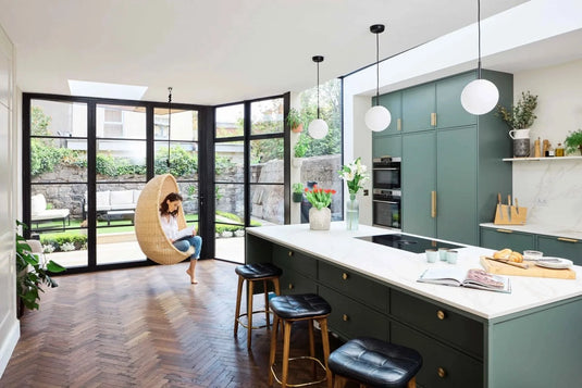 white oak tumbled herringbone solid wood flooring displayed in a kitchen