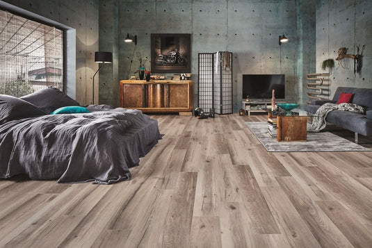 wilderness oak long laminate flooring displayed in a bedroom