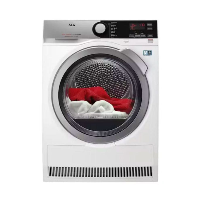 white condenser dryer with black and silver door and black and silver control panel