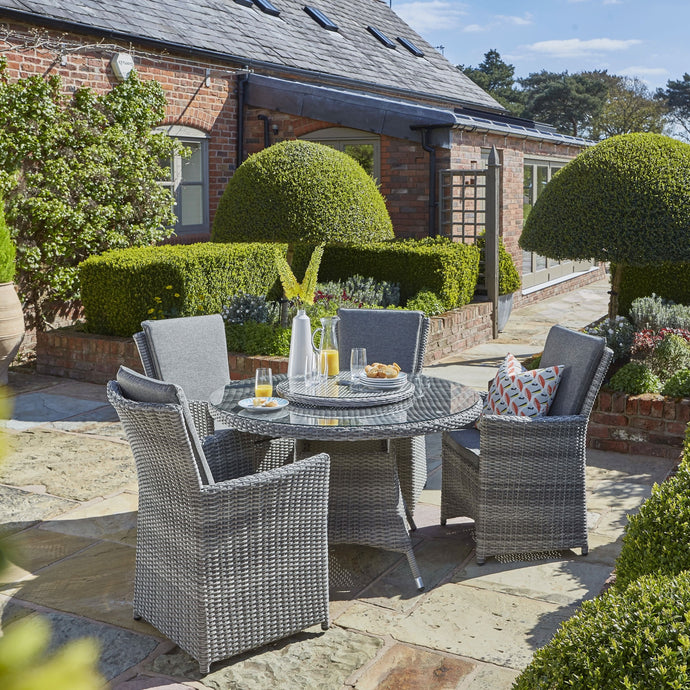 grey 4 seater set with round glass topped table