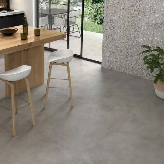 gris cosmo XL tile 60x120cm displayed in a kitchen
