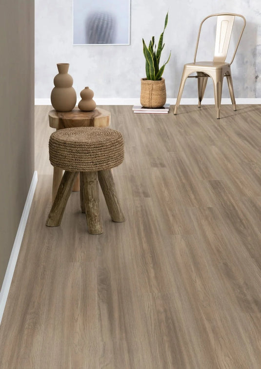 grey soria oak aqua laminate flooring on display in a home setting