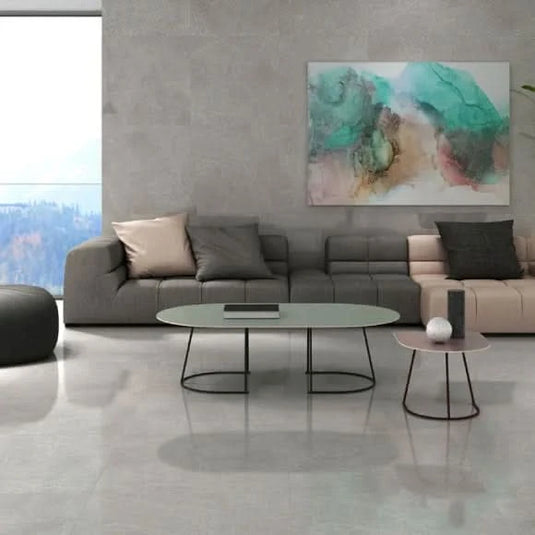 gris global tile 80x80cm displayed in a living area