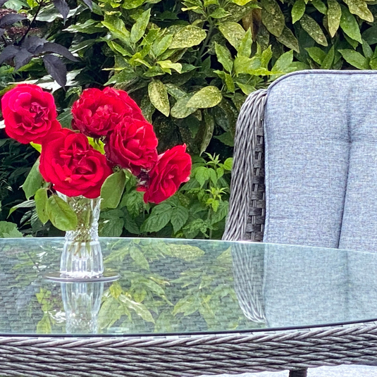 glass topped round table with hole for parasol