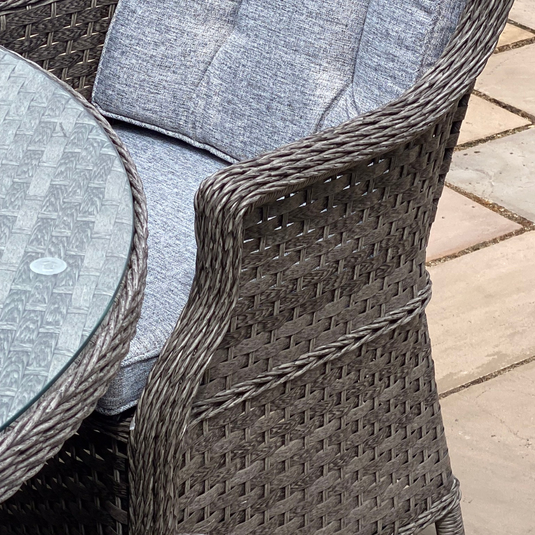 dark grey chair with base and back cushions