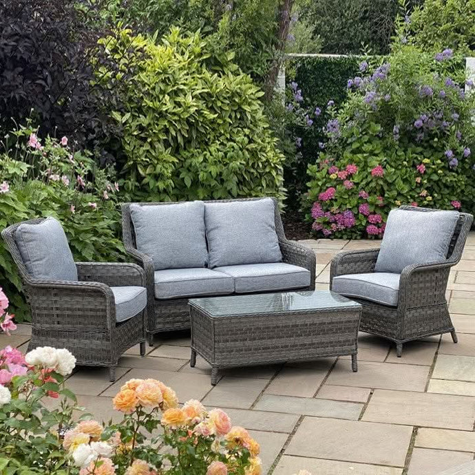 dark grey 2 seater coffee set with glass topped coffee table