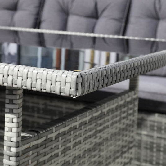 light grey rectangular table with glass top