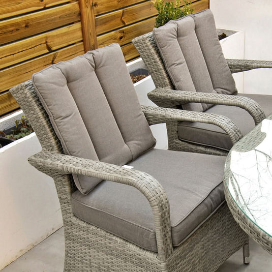 light grey armchairs with grey back and base cushions