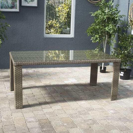glass topped rectangular table in a natural colour