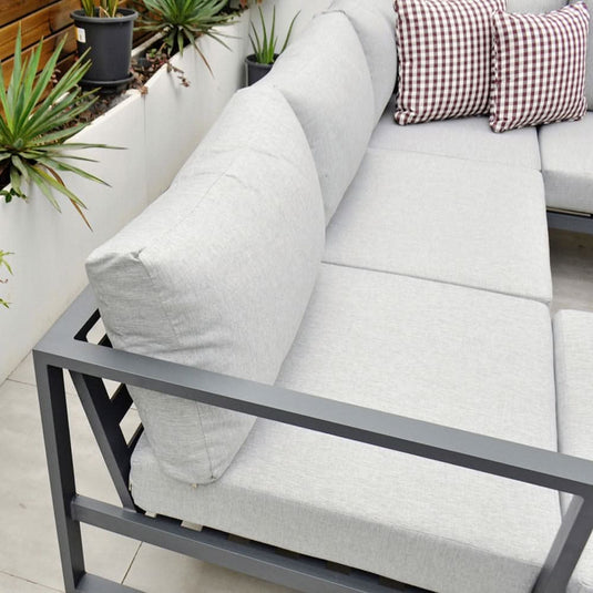 dark grey corner set with cushions