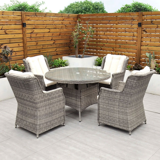 grey 4 seat set with 120cm glass topped round table and cream cushions