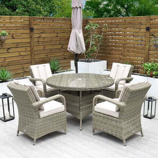 brown 4 seater set with round glass topped table
