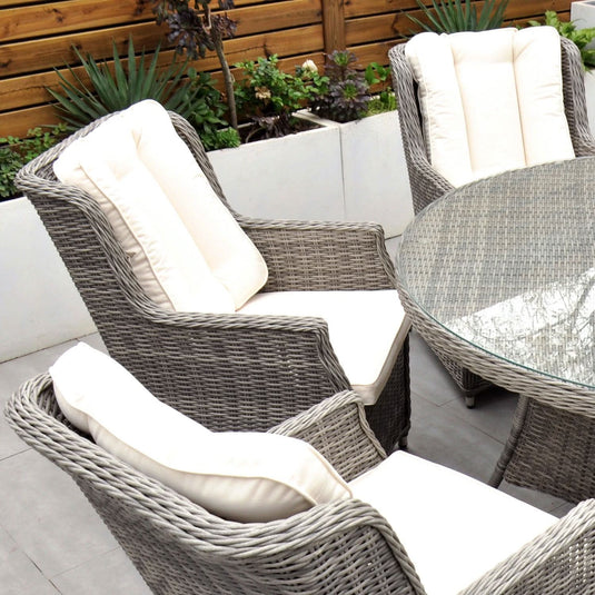 grey curved armchair with cream back and base cushions