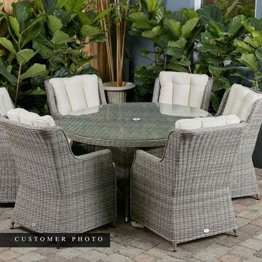 grey 6 seat set with 135cm glass topped round table and cream cushions