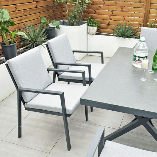 dark grey chairs with cushions