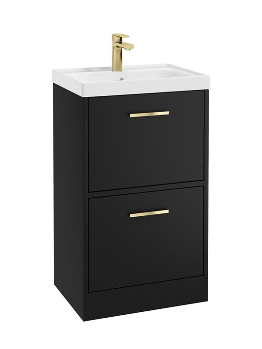 Black vanity unit with white countertop and gold fixtures on a white background